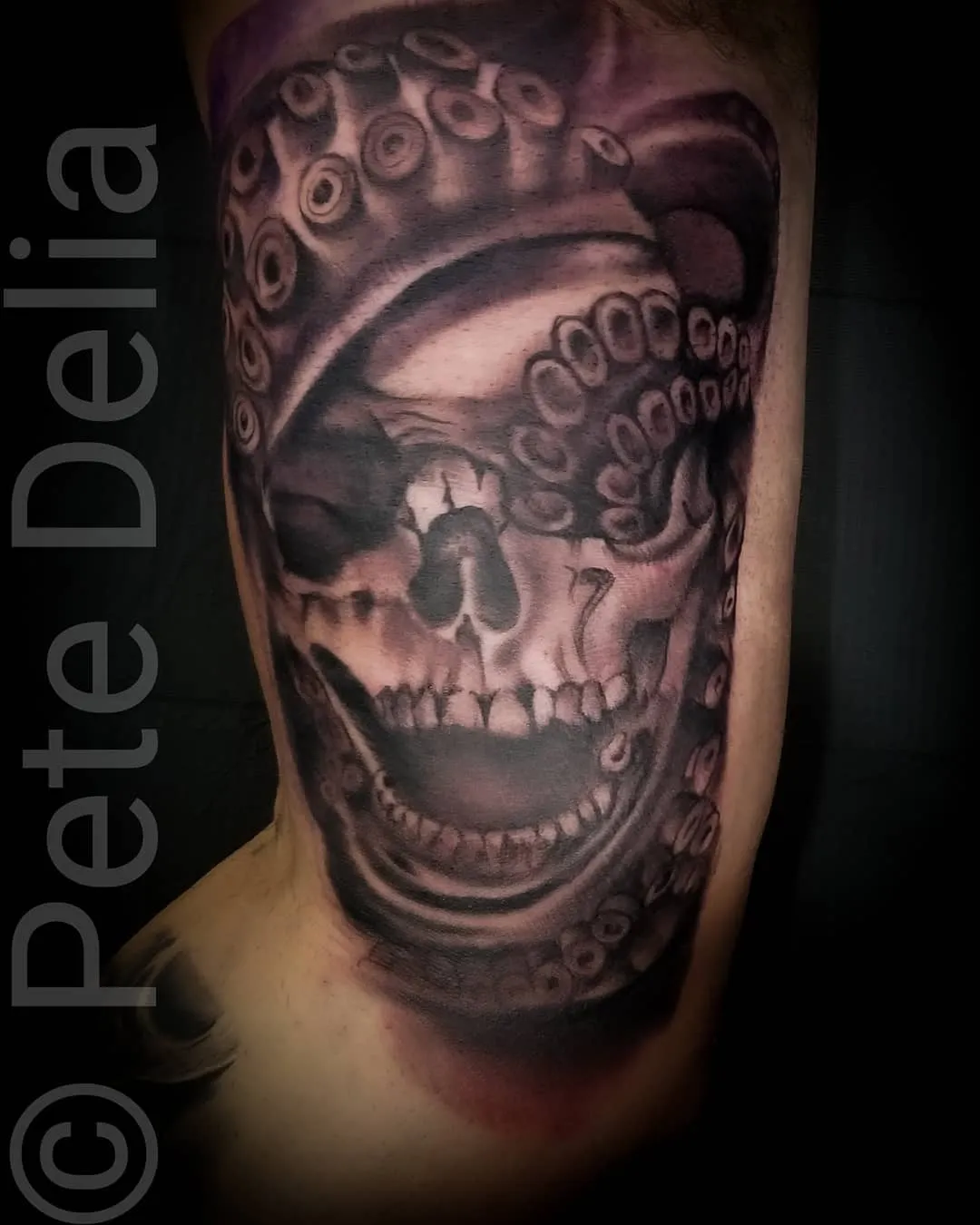 black & grey realism tattoo by Pete Delia at Fallen Raven Tattoo Studio in Simpsonville, SC