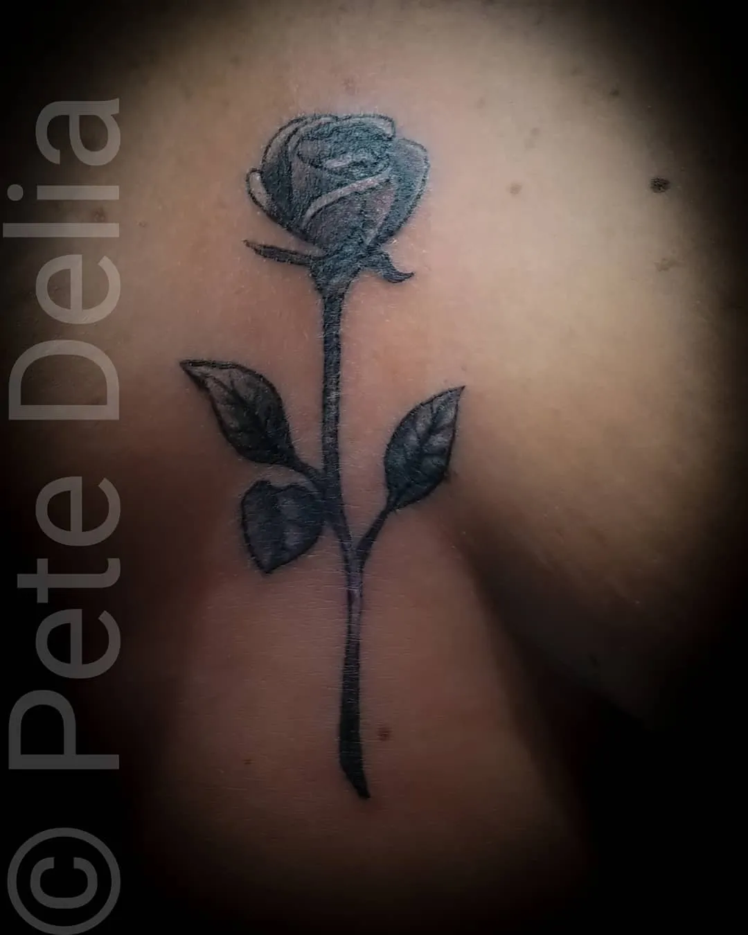 black & grey realism tattoo by Pete Delia at Fallen Raven Tattoo Studio in Simpsonville, SC