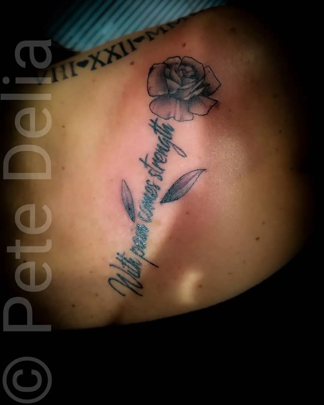black & grey realism tattoo by Pete Delia at Fallen Raven Tattoo Studio in Simpsonville, SC