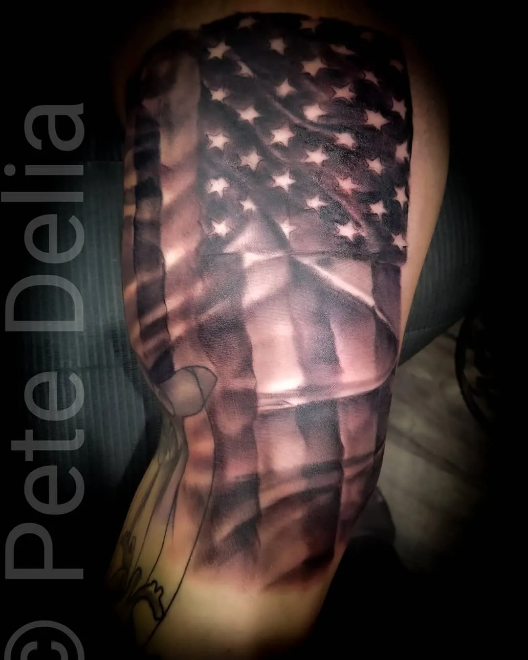 black & grey realism tattoo by Pete Delia at Fallen Raven Tattoo Studio in Simpsonville, SC