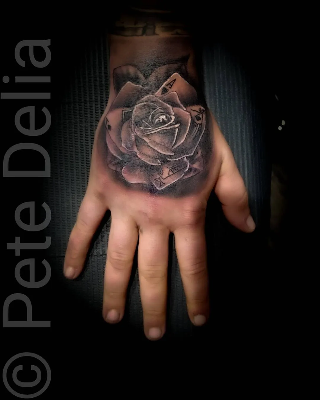 black & grey realism tattoo by Pete Delia at Fallen Raven Tattoo Studio in Simpsonville, SC
