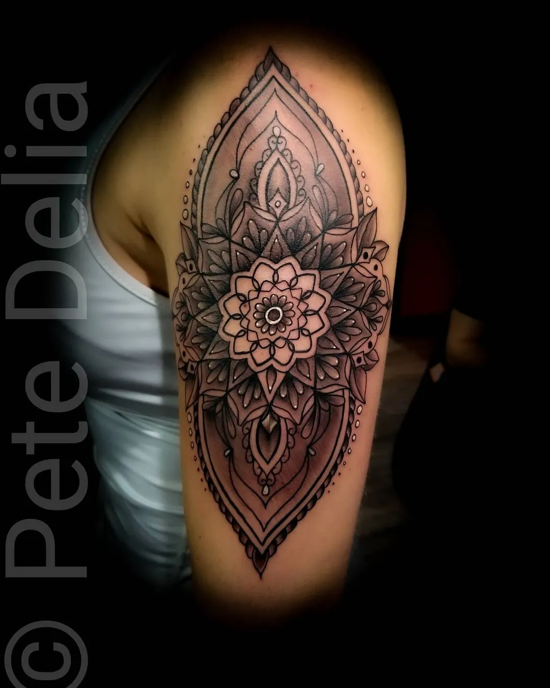 black & grey realism tattoo by Pete Delia at Fallen Raven Tattoo Studio in Simpsonville, SC