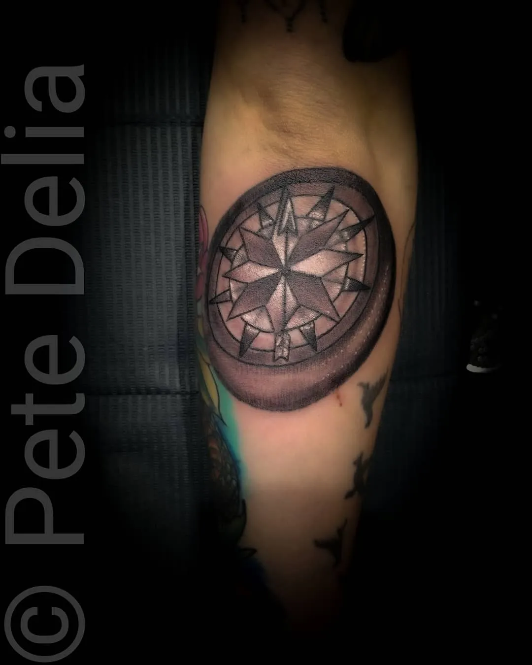 black & grey realism tattoo by Pete Delia at Fallen Raven Tattoo Studio in Simpsonville, SC