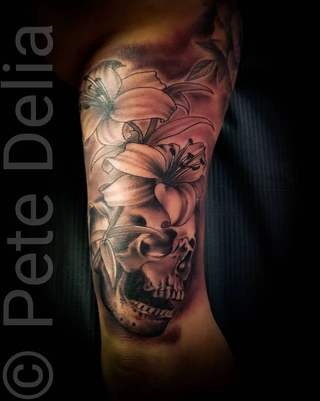 black & grey realism tattoo by Pete Delia at Fallen Raven Tattoo Studio in Simpsonville, SC