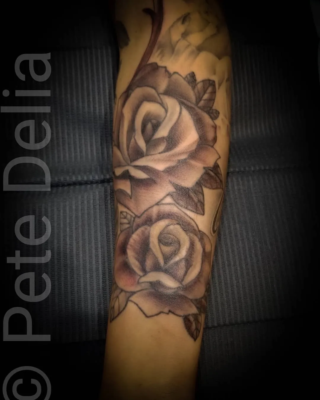 black & grey realism tattoo by Pete Delia at Fallen Raven Tattoo Studio in Simpsonville, SC