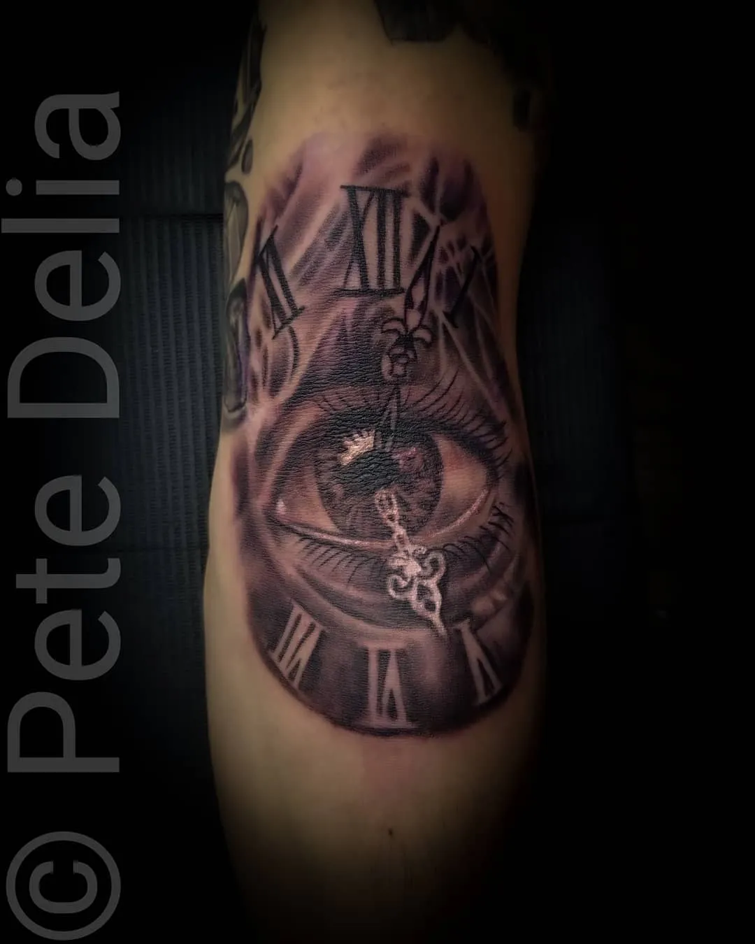 black & grey realism tattoo by Pete Delia at Fallen Raven Tattoo Studio in Simpsonville, SC