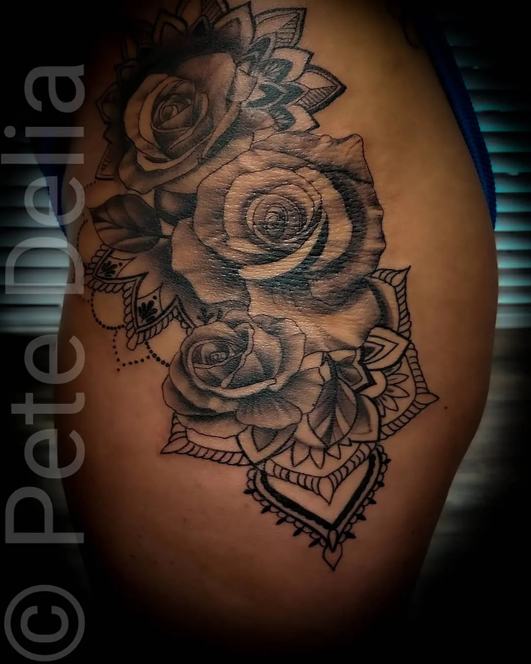 black & grey realism tattoo by Pete Delia at Fallen Raven Tattoo Studio in Simpsonville, SC