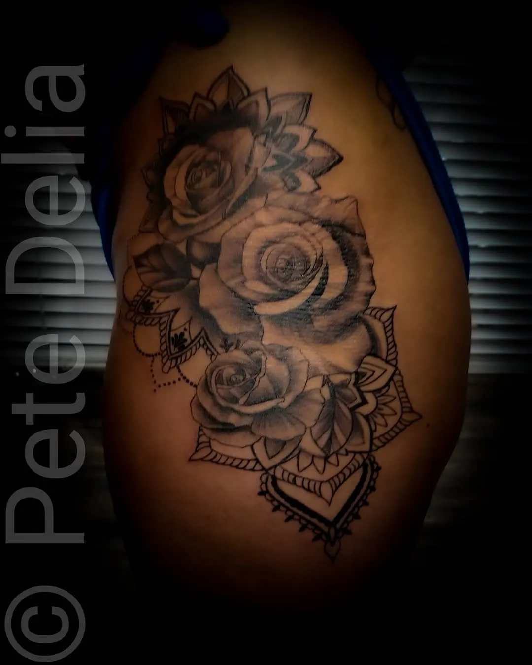 black & grey realism tattoo by Pete Delia at Fallen Raven Tattoo Studio in Simpsonville, SC