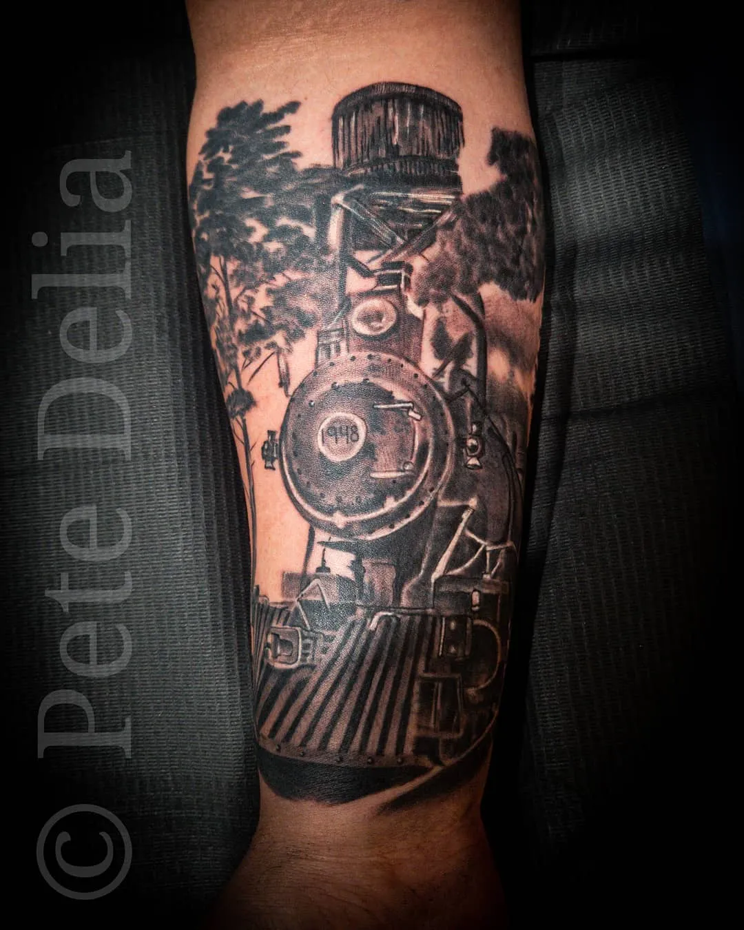 black & grey realism tattoo by Pete Delia at Fallen Raven Tattoo Studio in Simpsonville, SC