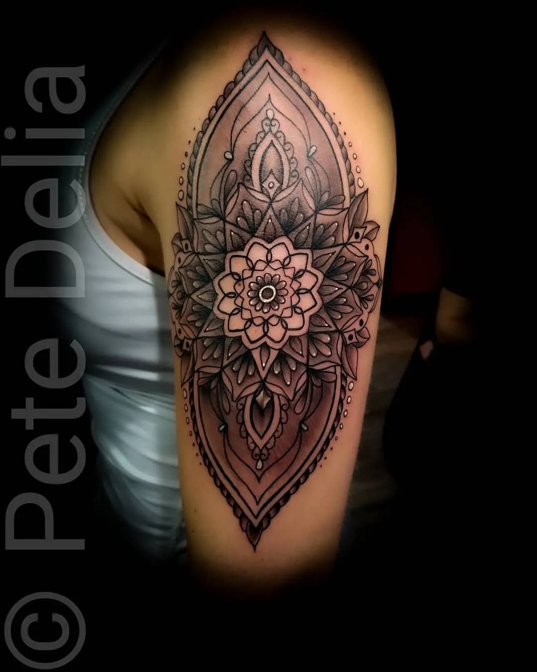 black & grey realism tattoo by Pete Delia at Fallen Raven Tattoo Studio in Simpsonville, SC