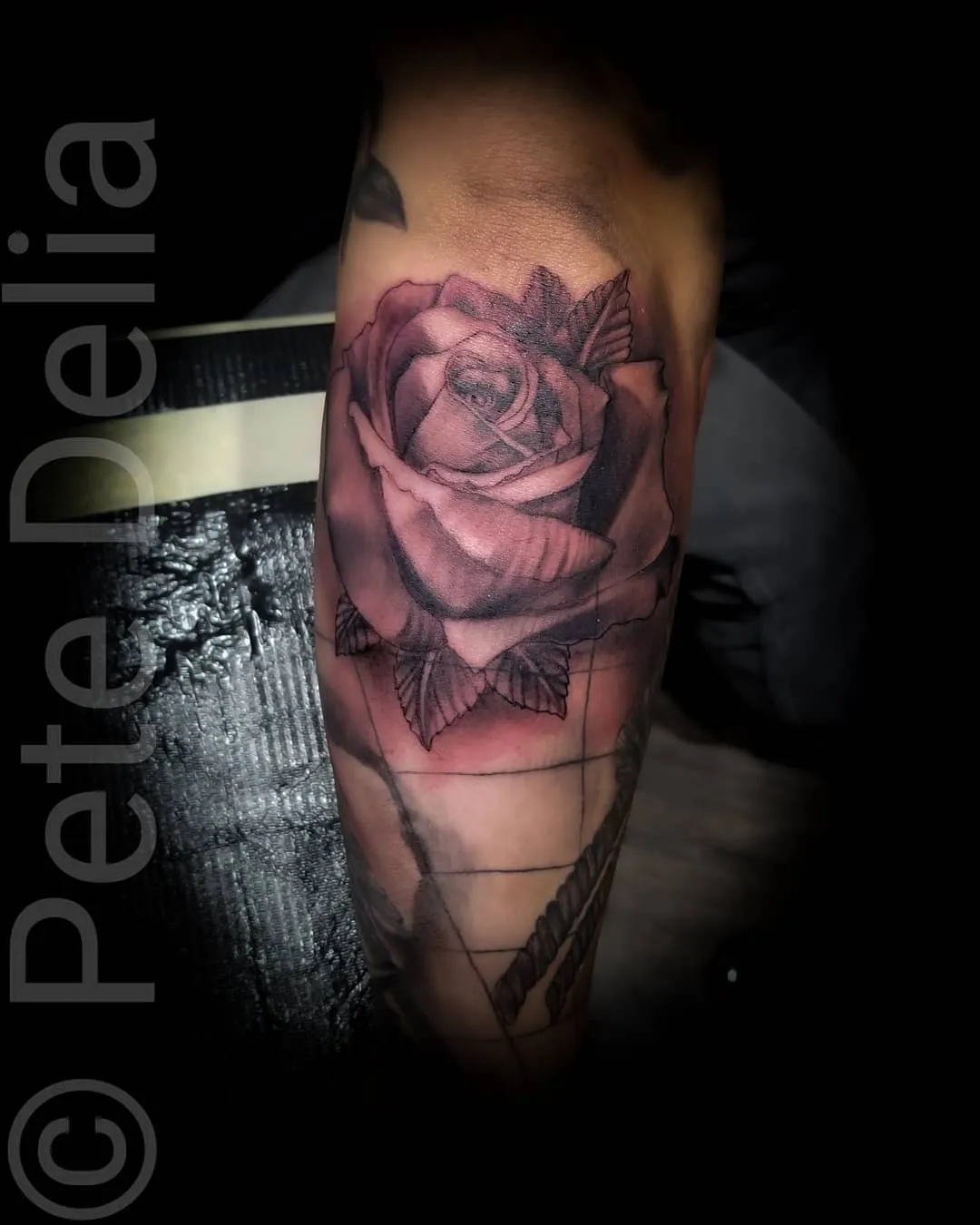 black & grey realism tattoo by Pete Delia at Fallen Raven Tattoo Studio in Simpsonville, SC
