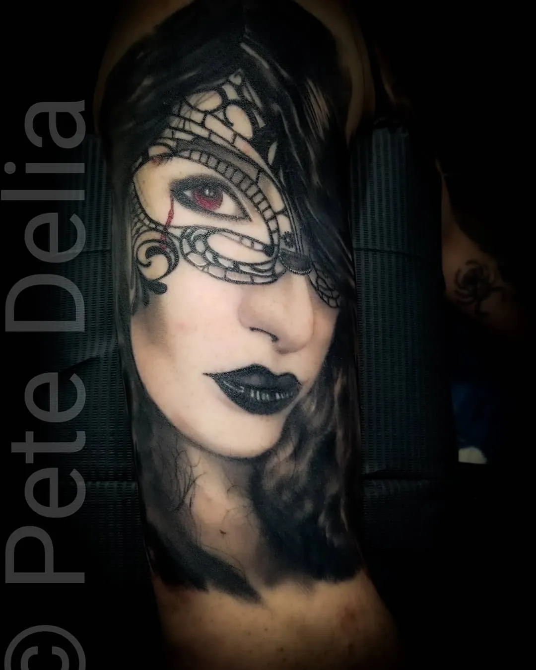 black & grey realism tattoo by Pete Delia at Fallen Raven Tattoo Studio in Simpsonville, SC