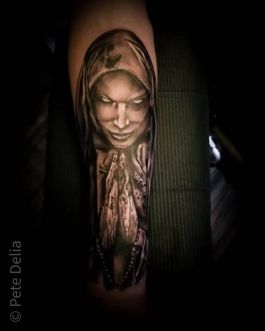 black & grey realism tattoo by Pete Delia at Fallen Raven Tattoo Studio in Simpsonville, SC