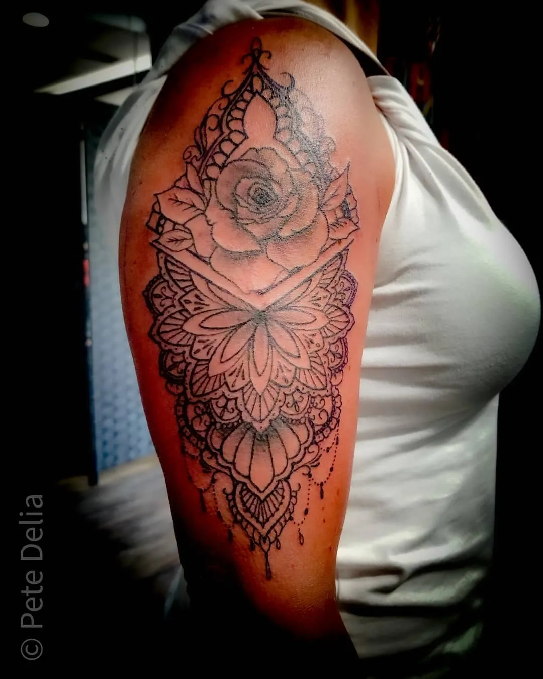 black & grey realism tattoo by Pete Delia at Fallen Raven Tattoo Studio in Simpsonville, SC