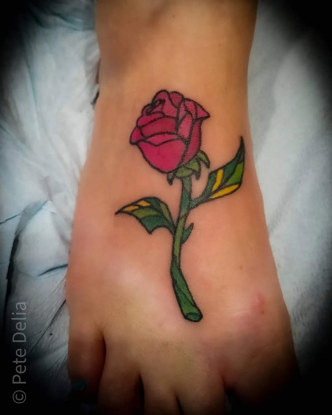 black & grey realism tattoo by Pete Delia at Fallen Raven Tattoo Studio in Simpsonville, SC