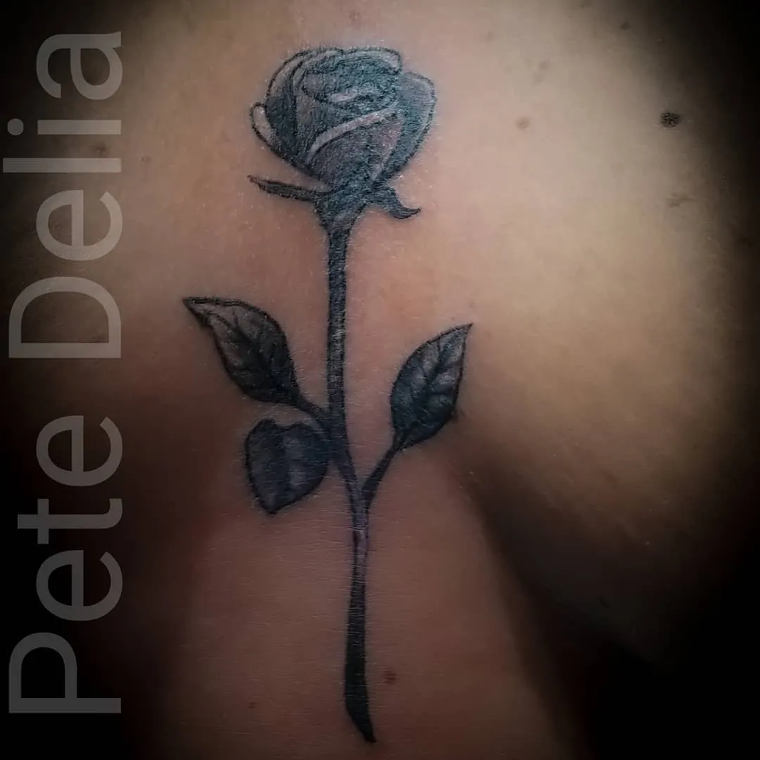 black & grey realism tattoo by Pete Delia at Fallen Raven Tattoo Studio in Simpsonville, SC