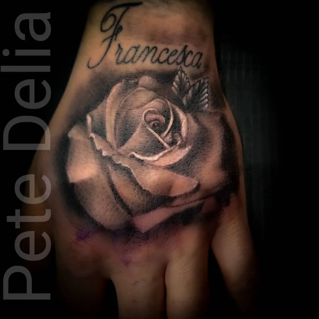 black & grey realism tattoo by Pete Delia at Fallen Raven Tattoo Studio in Simpsonville, SC