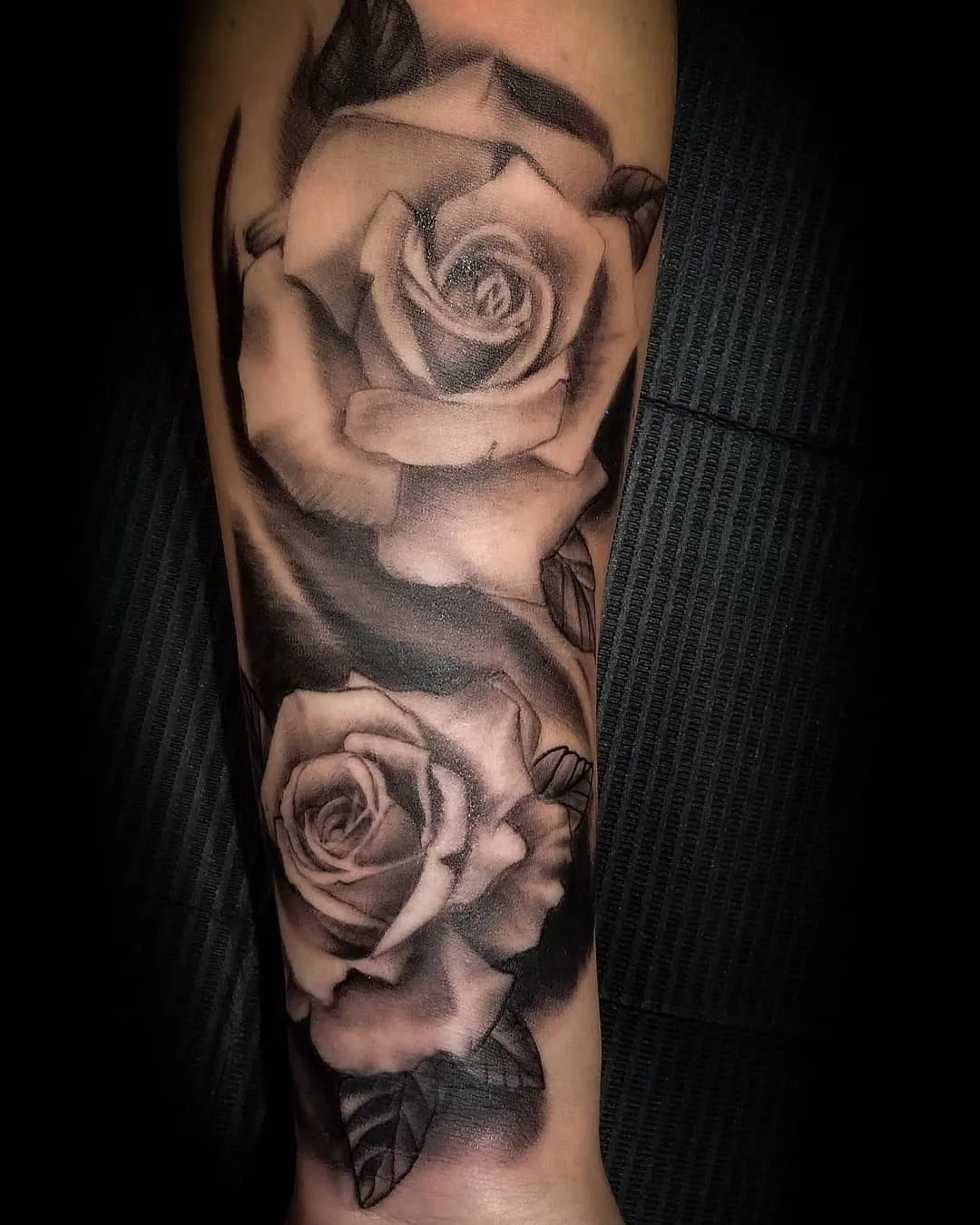 black & grey realism tattoo by Pete Delia at Fallen Raven Tattoo Studio in Simpsonville, SC