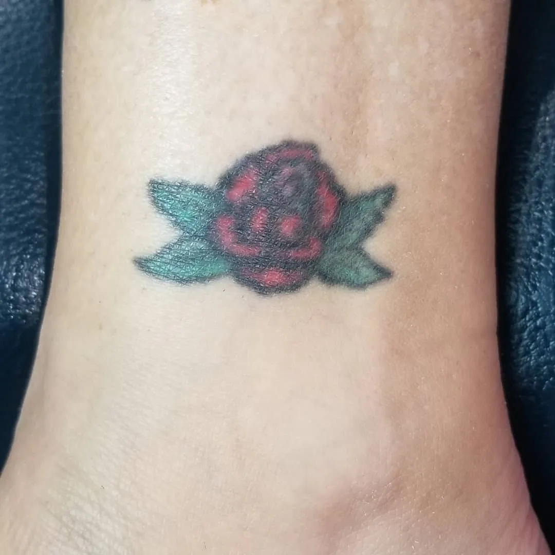black & grey realism tattoo by Pete Delia at Fallen Raven Tattoo Studio in Simpsonville, SC