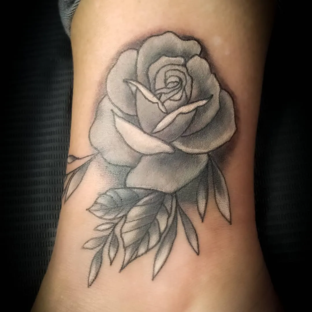 black & grey realism tattoo by Pete Delia at Fallen Raven Tattoo Studio in Simpsonville, SC