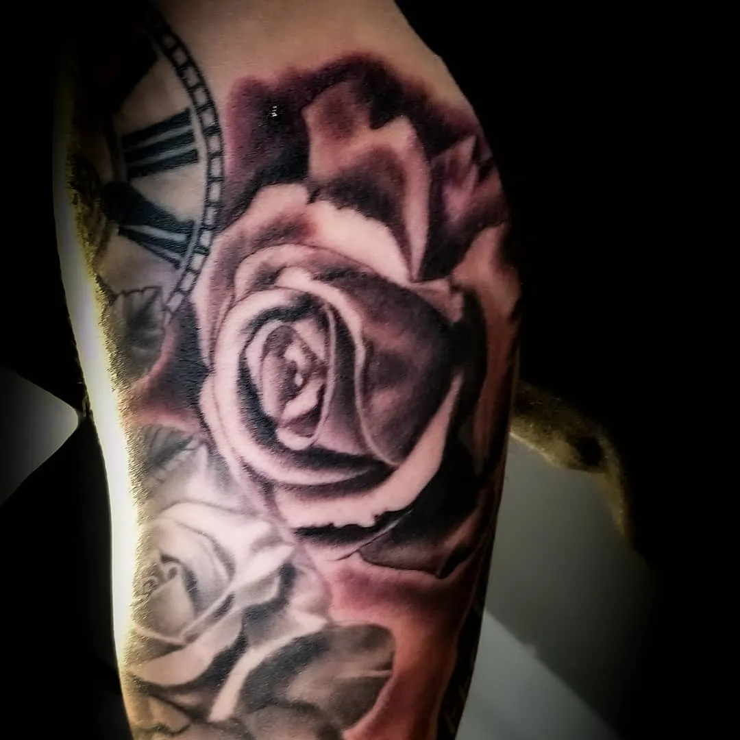 black & grey realism tattoo by Pete Delia at Fallen Raven Tattoo Studio in Simpsonville, SC