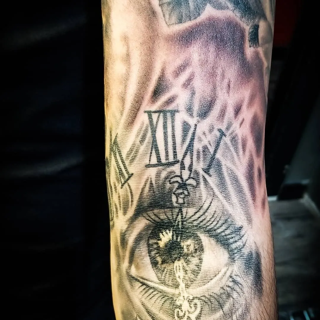 black & grey realism tattoo by Pete Delia at Fallen Raven Tattoo Studio in Simpsonville, SC