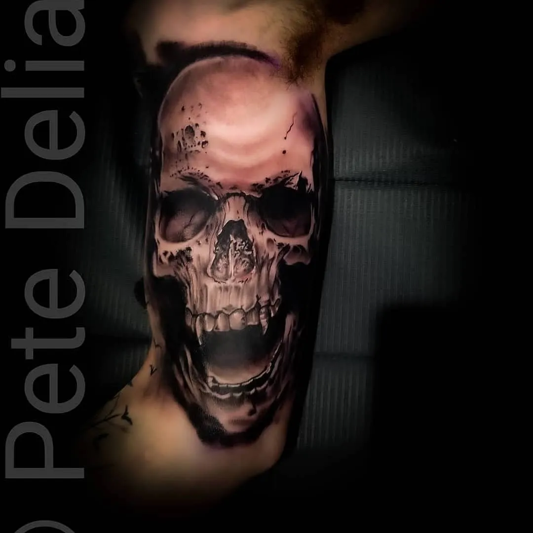 black & grey realism tattoo by Pete Delia at Fallen Raven Tattoo Studio in Simpsonville, SC