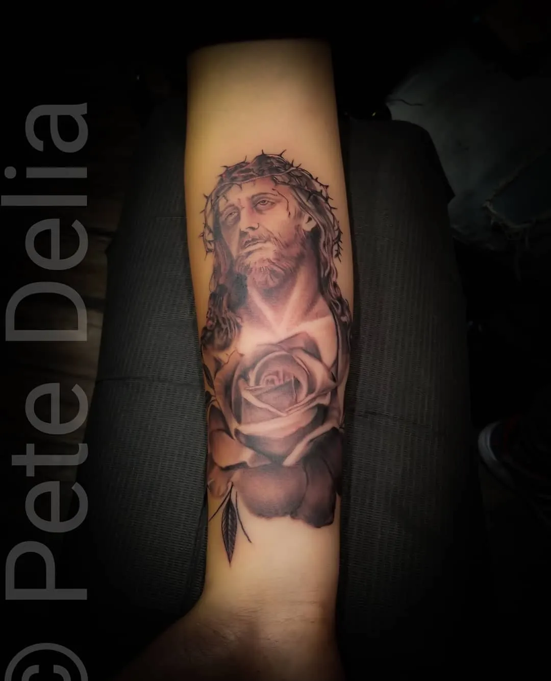 black & grey realism tattoo by Pete Delia at Fallen Raven Tattoo Studio in Simpsonville, SC
