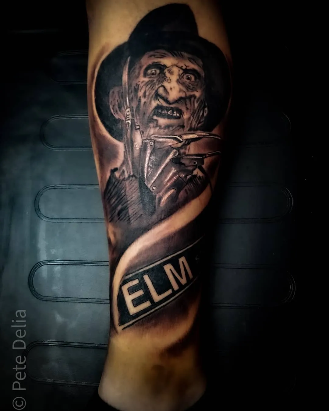 black & grey realism tattoo by Pete Delia at Fallen Raven Tattoo Studio in Simpsonville, SC