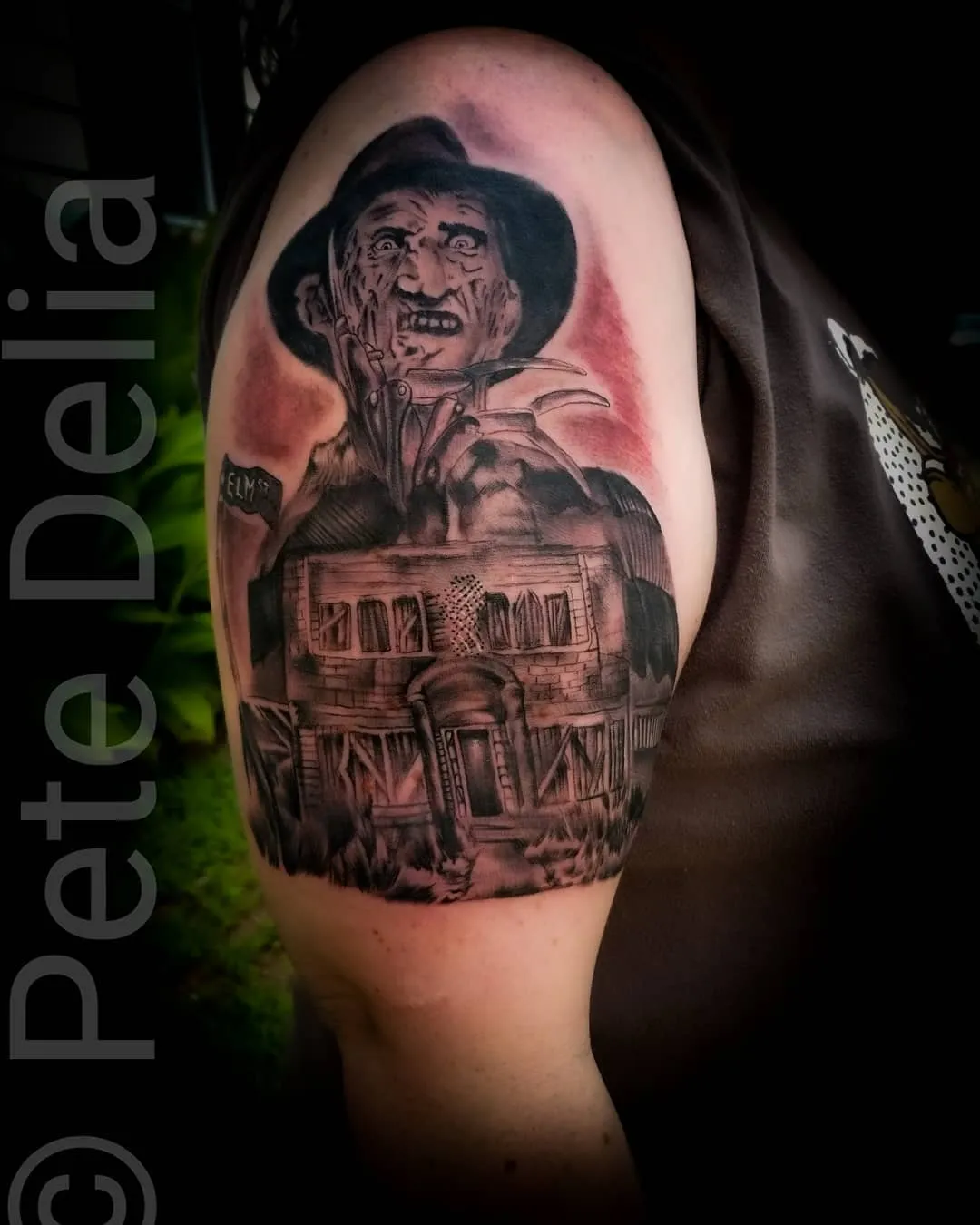 black & grey realism tattoo by Pete Delia at Fallen Raven Tattoo Studio in Simpsonville, SC