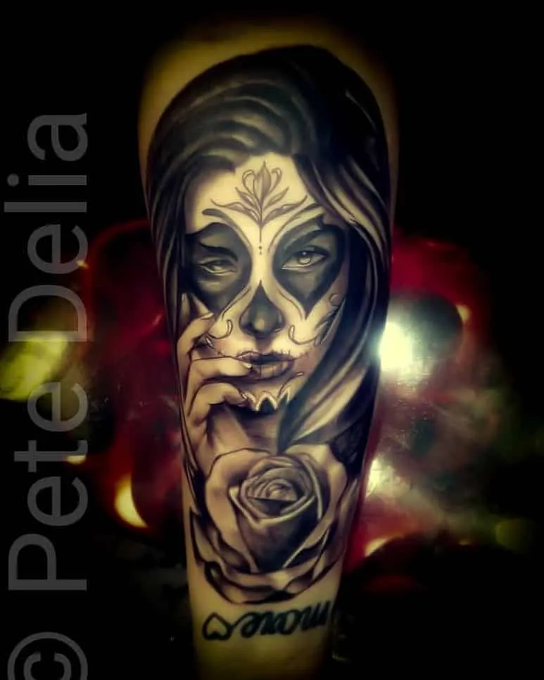 black & grey realism tattoo by Pete Delia at Fallen Raven Tattoo Studio in Simpsonville, SC