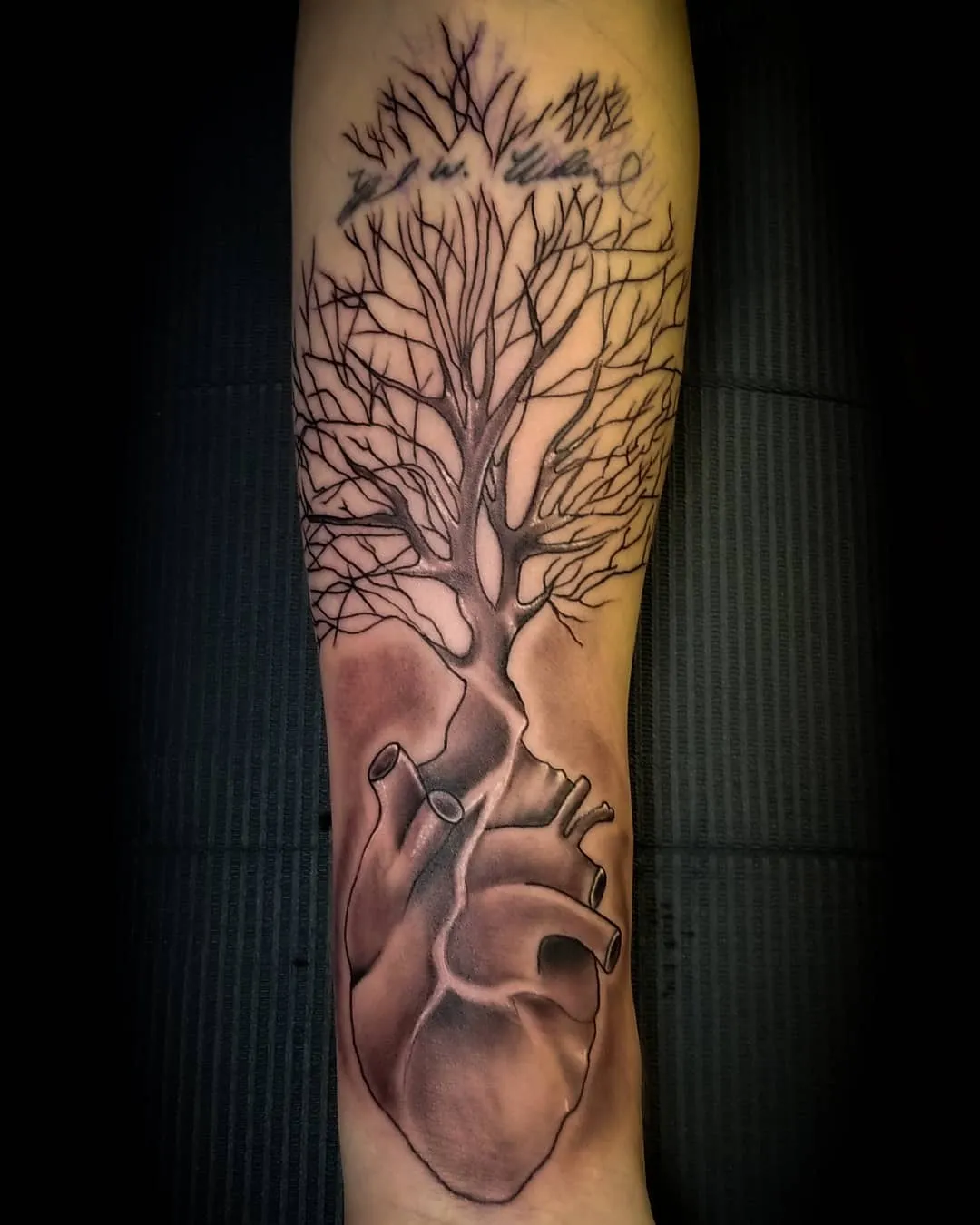 black & grey realism tattoo by Pete Delia at Fallen Raven Tattoo Studio in Simpsonville, SC
