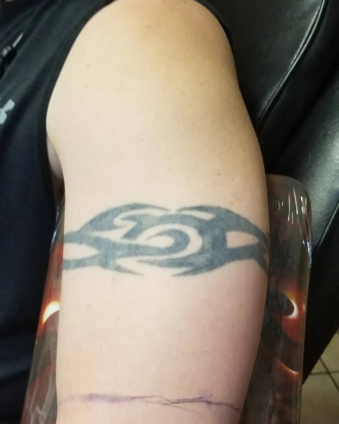 black & grey realism tattoo by Pete Delia at Fallen Raven Tattoo Studio in Simpsonville, SC
