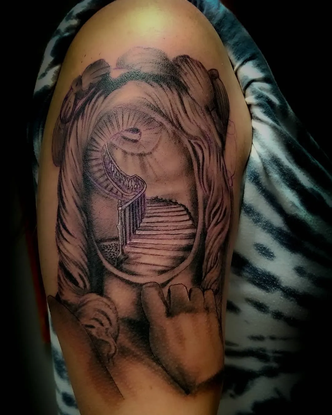 black & grey realism tattoo by Pete Delia at Fallen Raven Tattoo Studio in Simpsonville, SC
