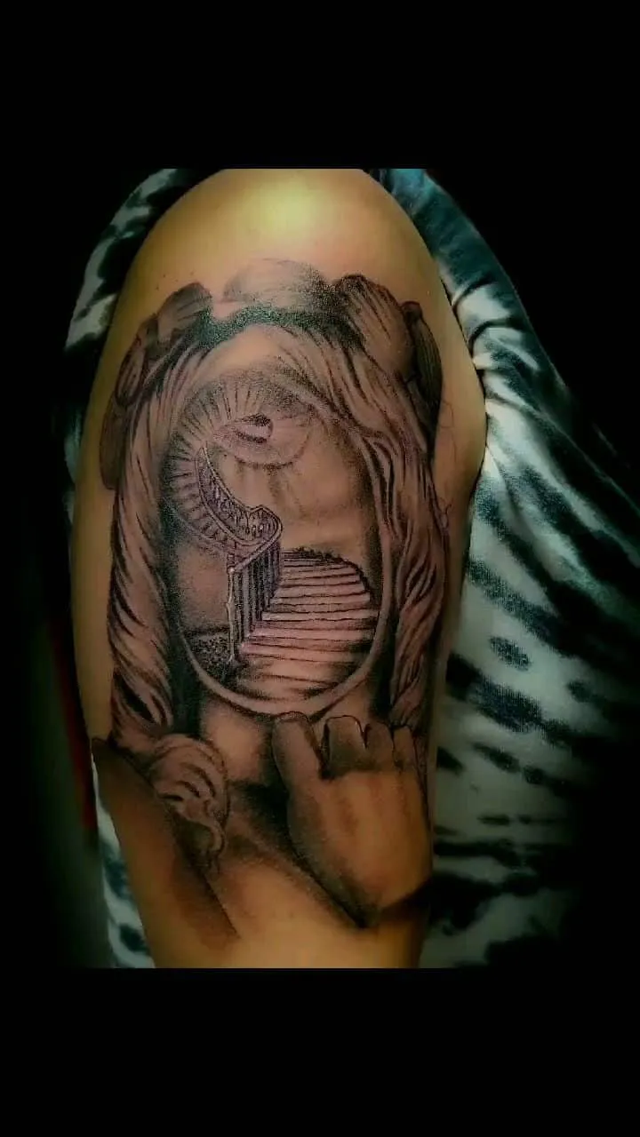 black & grey realism tattoo by Pete Delia at Fallen Raven Tattoo Studio in Simpsonville, SC