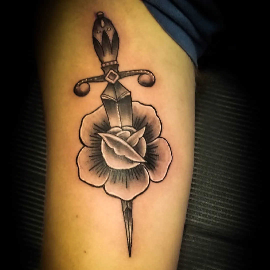 black & grey realism tattoo by Pete Delia at Fallen Raven Tattoo Studio in Simpsonville, SC