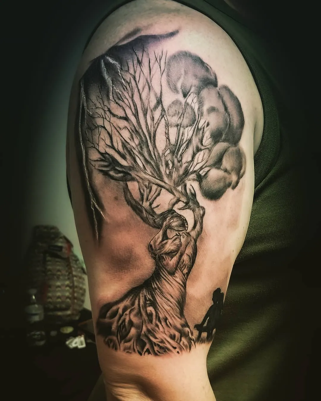 black & grey realism tattoo by Pete Delia at Fallen Raven Tattoo Studio in Simpsonville, SC