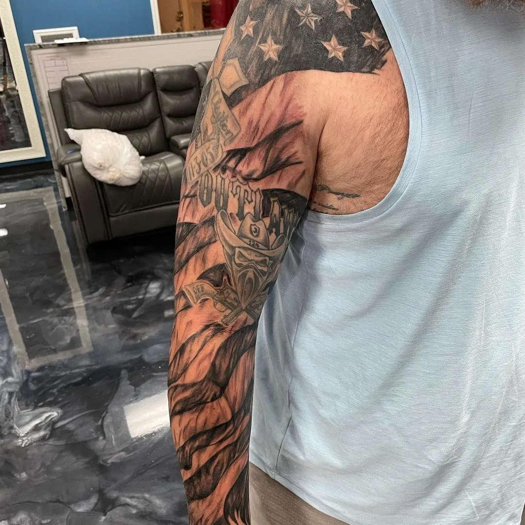 black & grey realism tattoo by TJ Cornelius at Fallen Raven Tattoo Studio in Simpsonville, SC