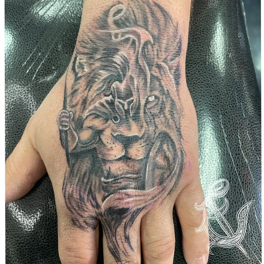 black & grey realism tattoo by TJ Cornelius at Fallen Raven Tattoo Studio in Simpsonville, SC