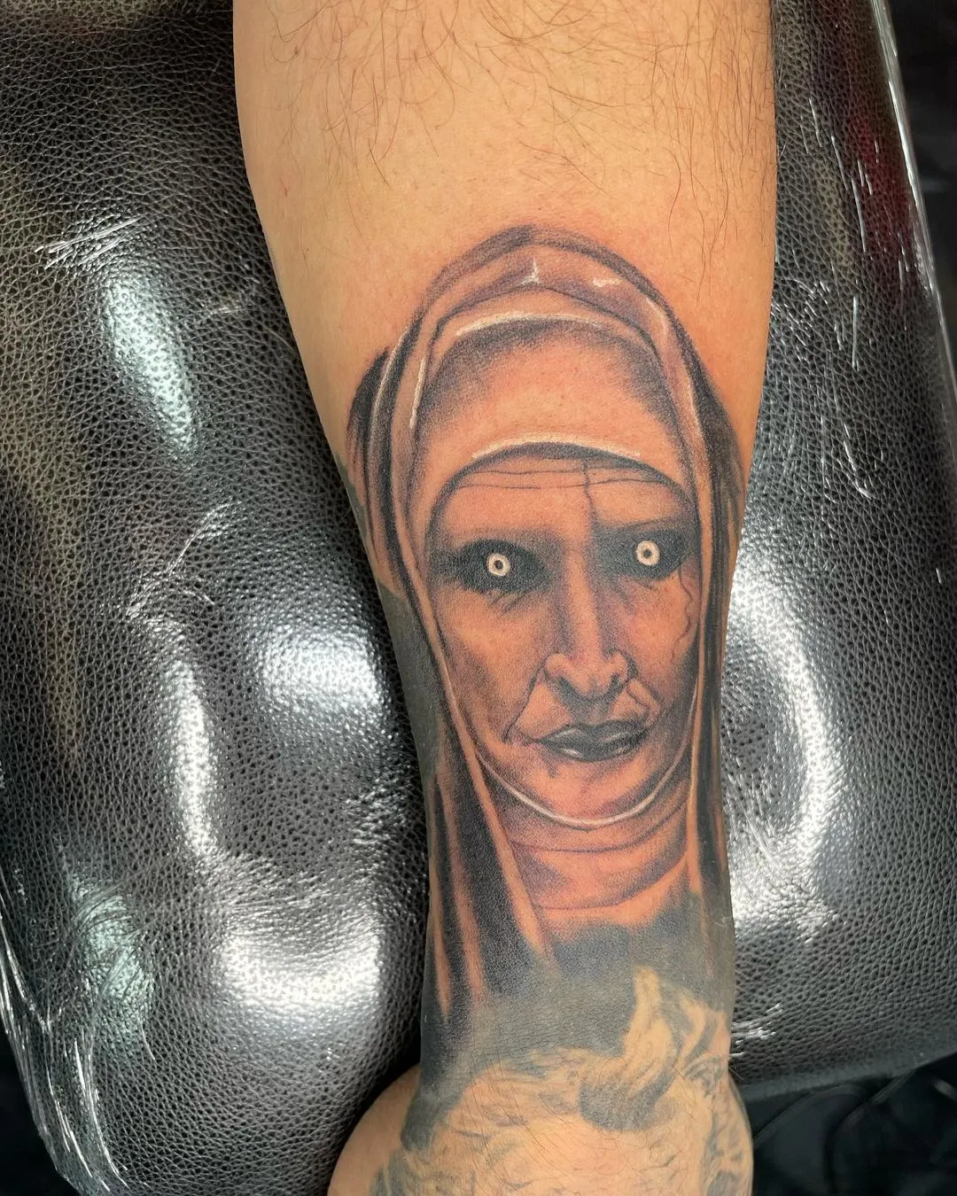 black & grey realism tattoo by TJ Cornelius at Fallen Raven Tattoo Studio in Simpsonville, SC