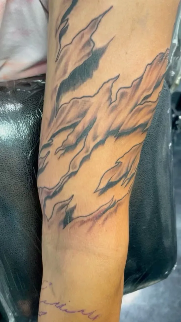 custom tattoos tattoo by TJ Cornelius at Fallen Raven Tattoo Studio in Simpsonville, SC