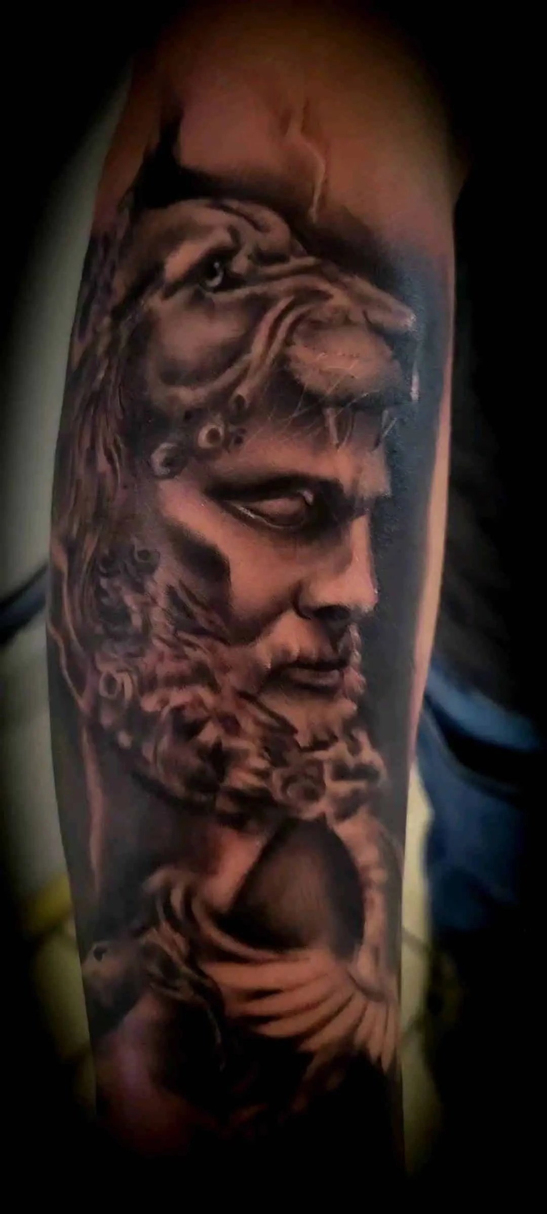 black & grey realism tattoo by Pete Delia at Fallen Raven Tattoo Studio in Simpsonville, SC