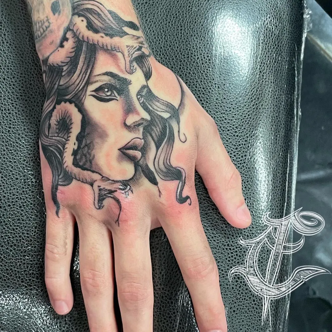 black & grey realism tattoo by TJ Cornelius at Fallen Raven Tattoo Studio in Simpsonville, SC