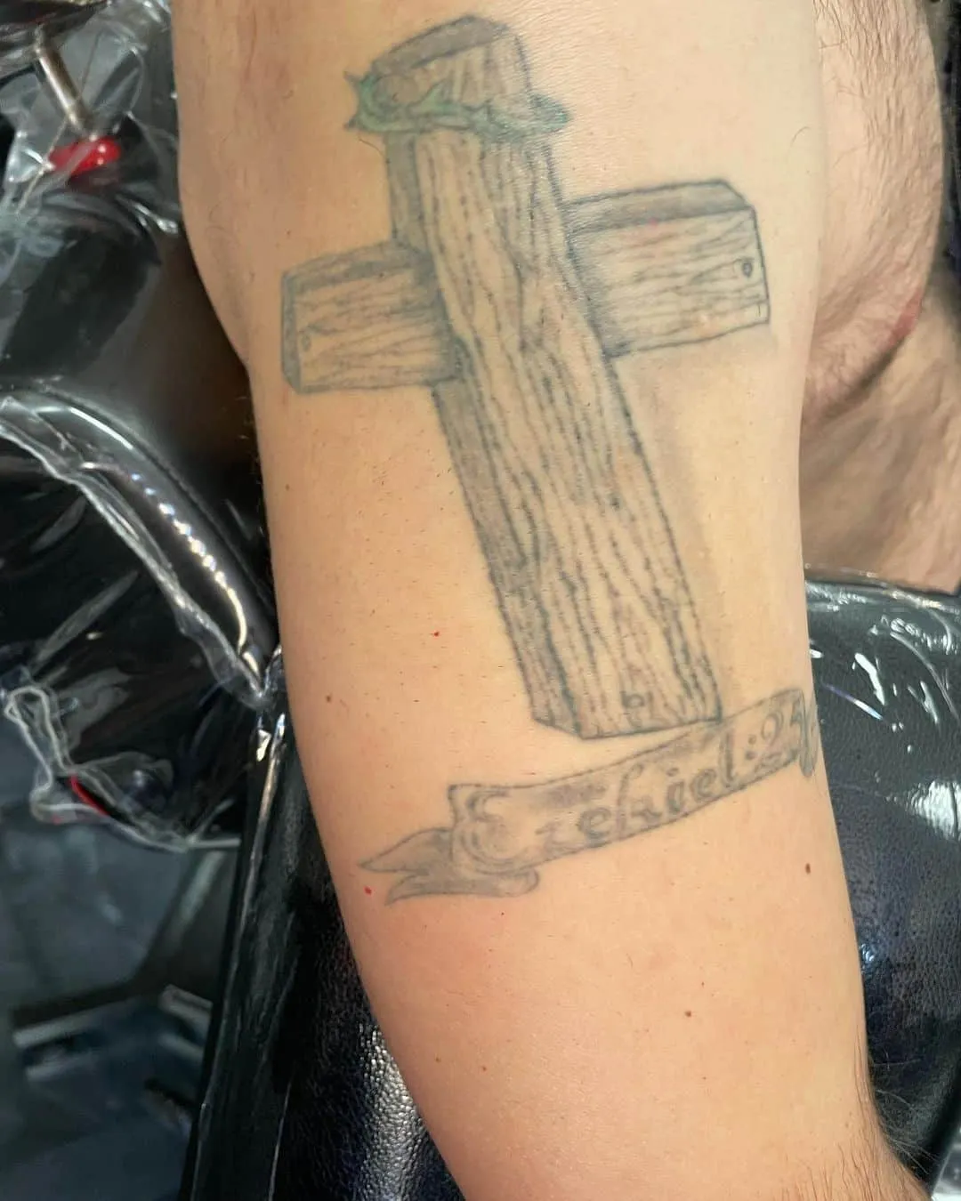 black & grey realism tattoo by TJ Cornelius at Fallen Raven Tattoo Studio in Simpsonville, SC