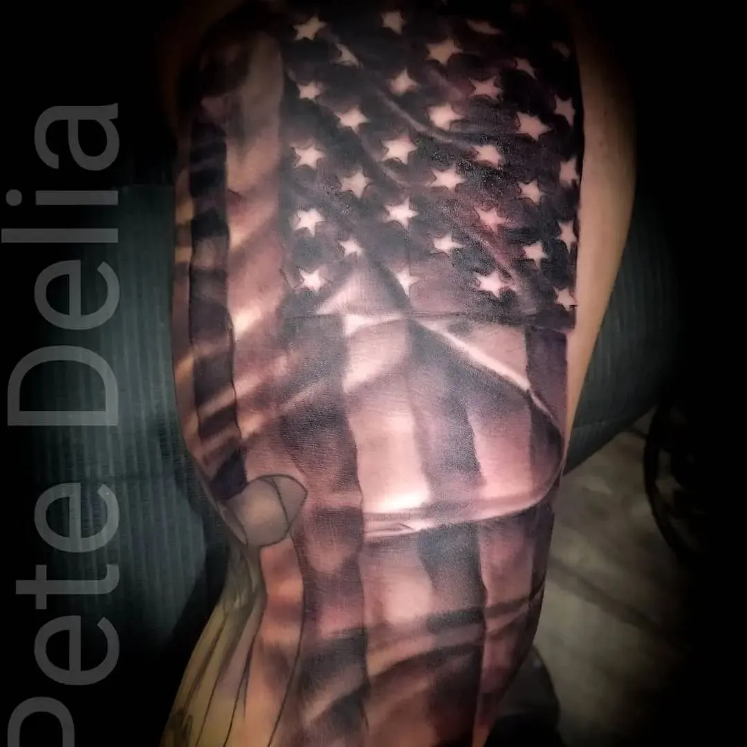 black & grey realism tattoo by Pete Delia at Fallen Raven Tattoo Studio in Simpsonville, SC