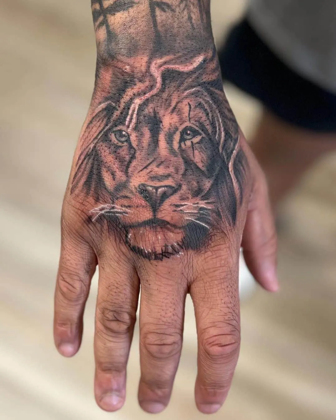 black & grey realism tattoo by TJ Cornelius at Fallen Raven Tattoo Studio in Simpsonville, SC