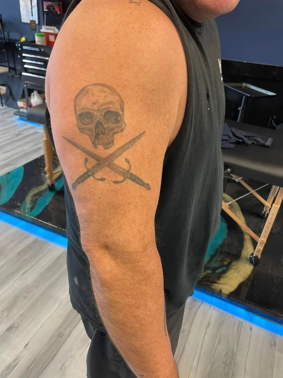 black & grey realism tattoo by TJ Cornelius at Fallen Raven Tattoo Studio in Simpsonville, SC