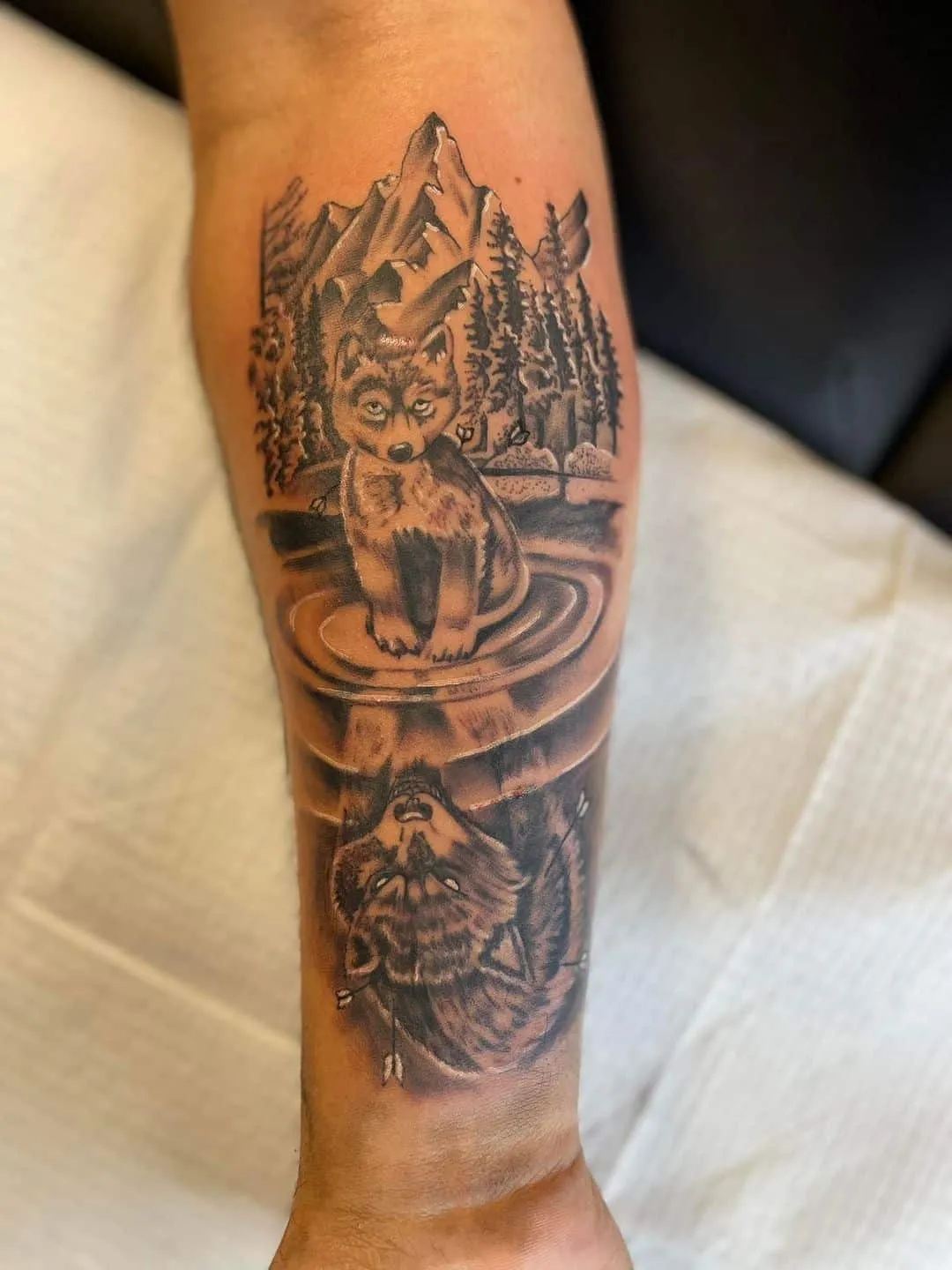 black & grey realism tattoo by TJ Cornelius at Fallen Raven Tattoo Studio in Simpsonville, SC