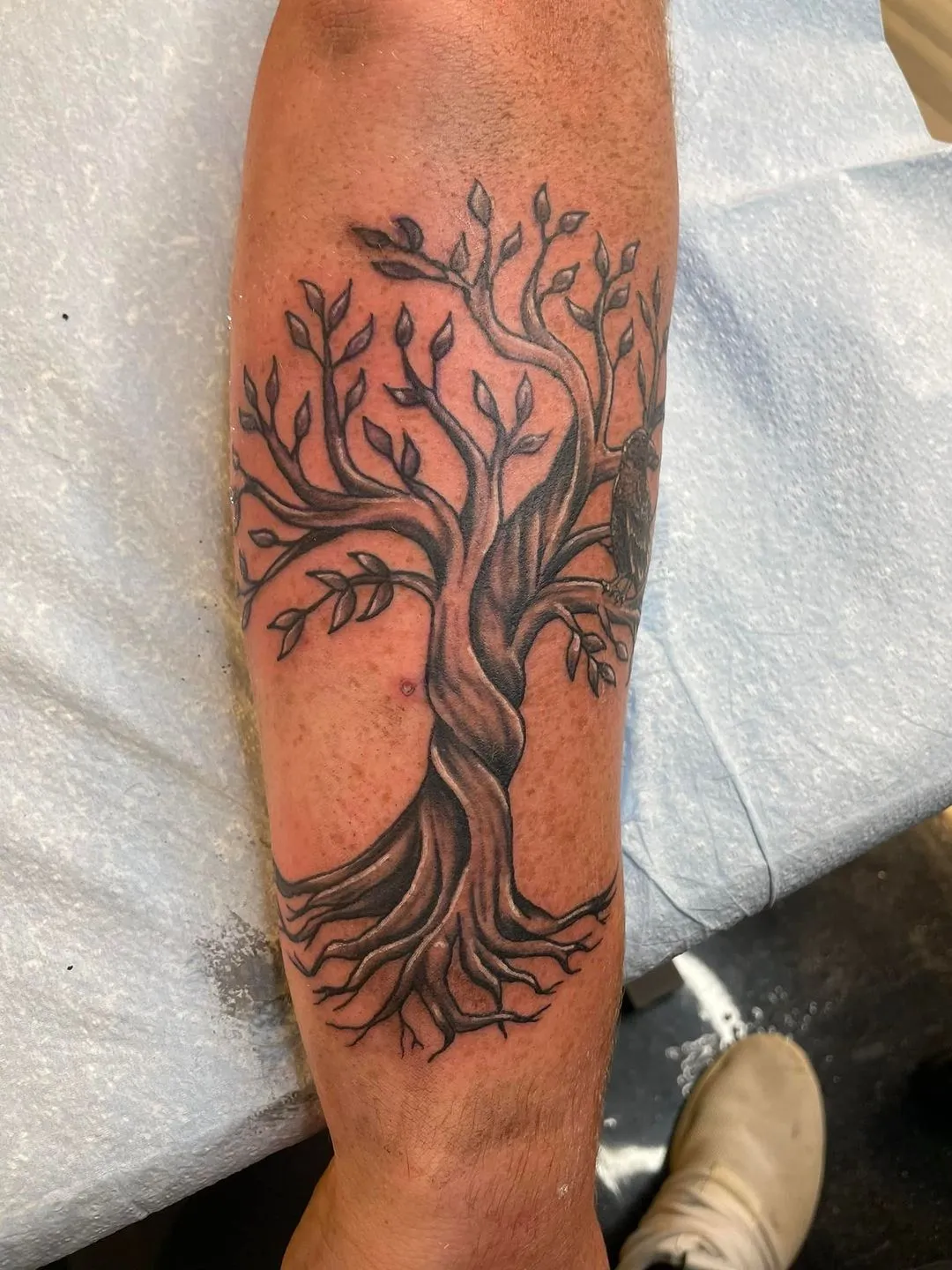 black & grey realism tattoo by TJ Cornelius at Fallen Raven Tattoo Studio in Simpsonville, SC