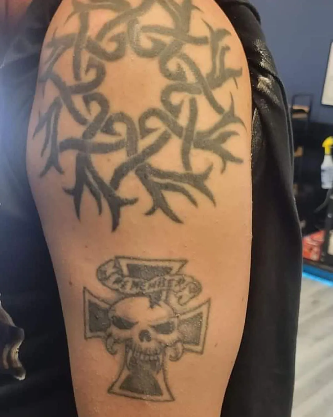 black & grey realism tattoo by Pete Delia at Fallen Raven Tattoo Studio in Simpsonville, SC